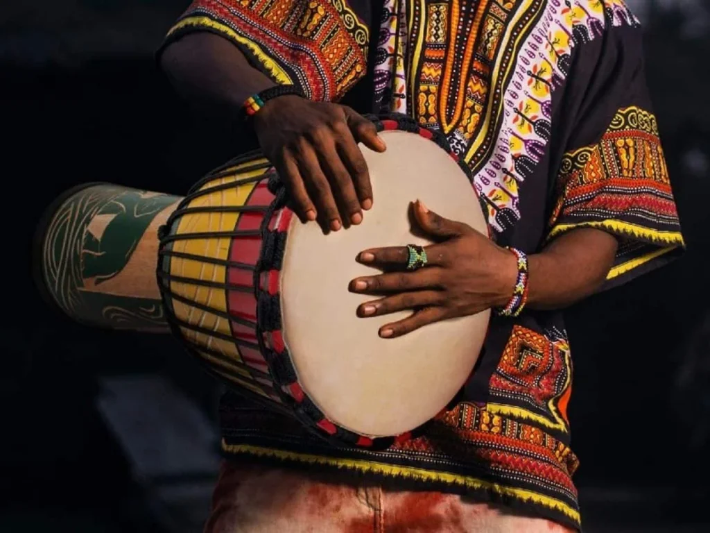 man playing djembe drum 2048x1536 1